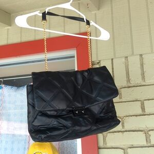 Gorgeous quilted Betsey Johnson purse with a chain strap.